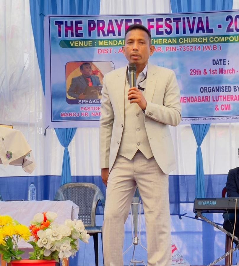 Overseer Manoj Kr. Narjinary speaking at an event