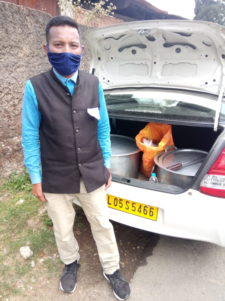 Ready for food distribution with a car full of food.