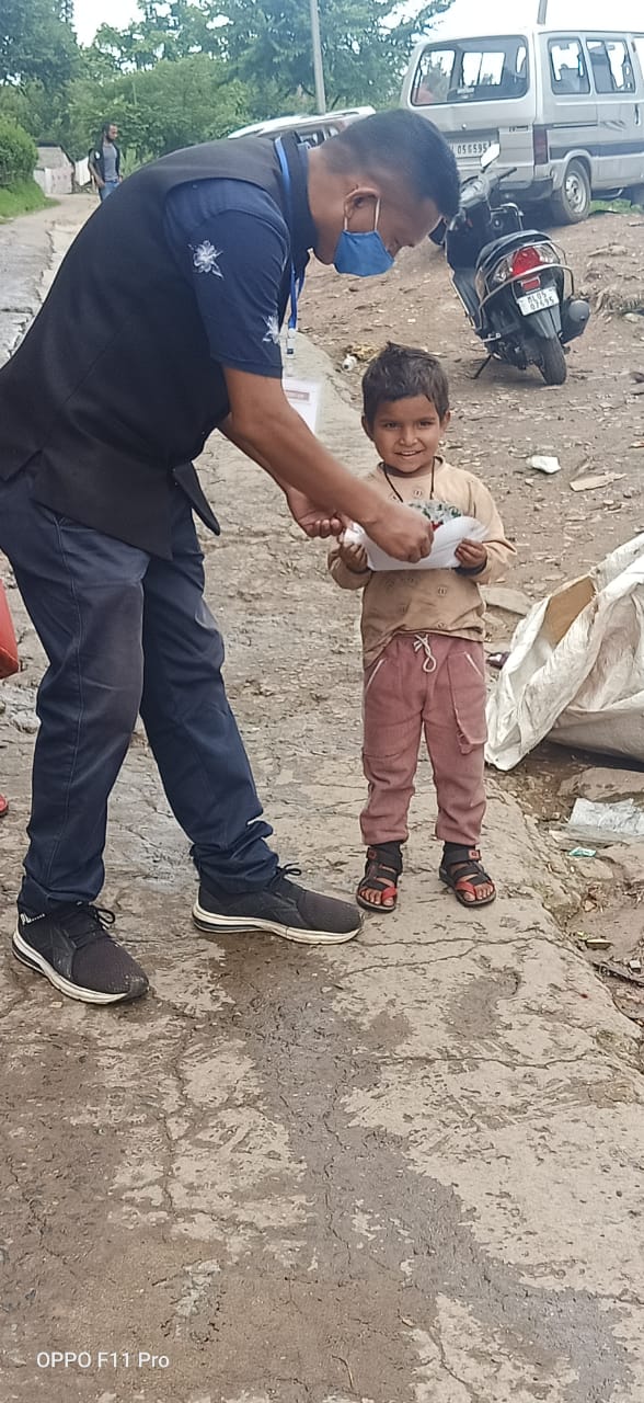 Giving a meal to a small child.