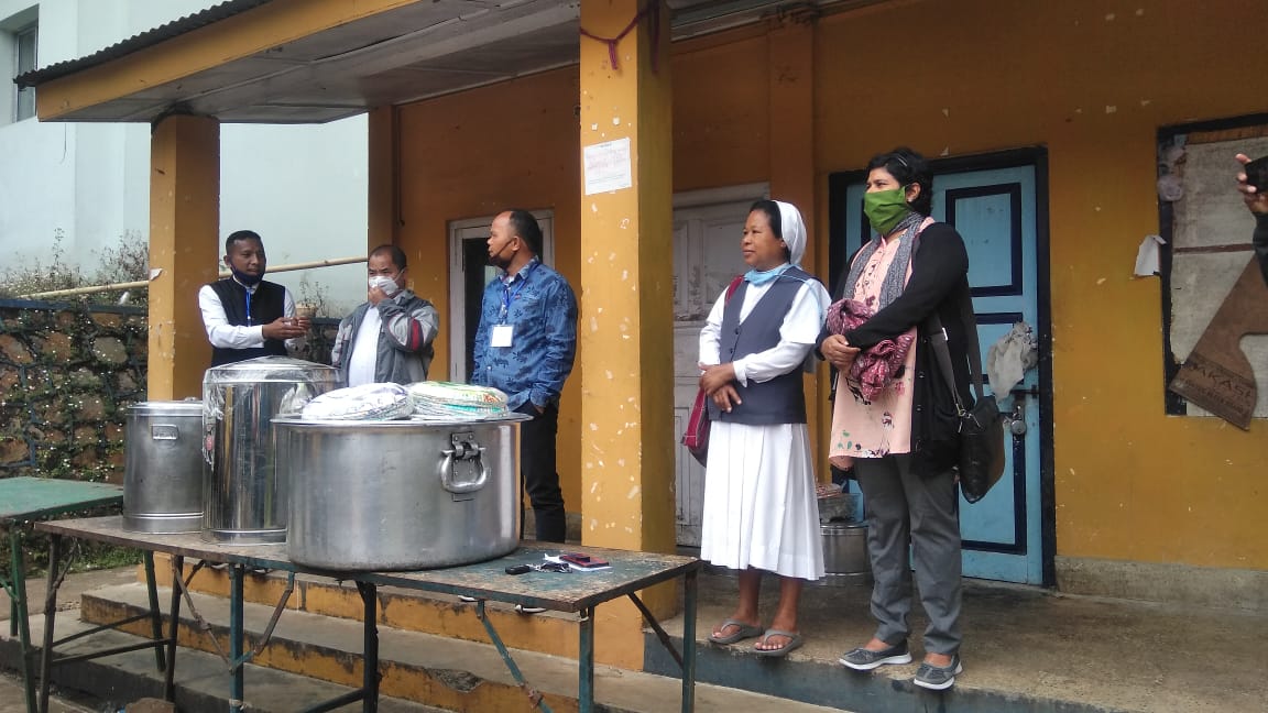 Team ready at a food distribution station.