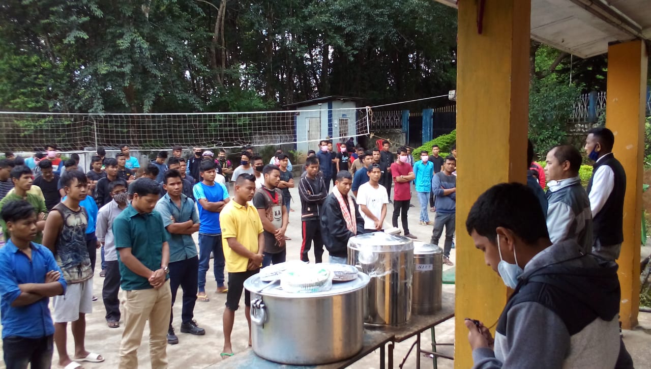 Crowd gathered for a meal.