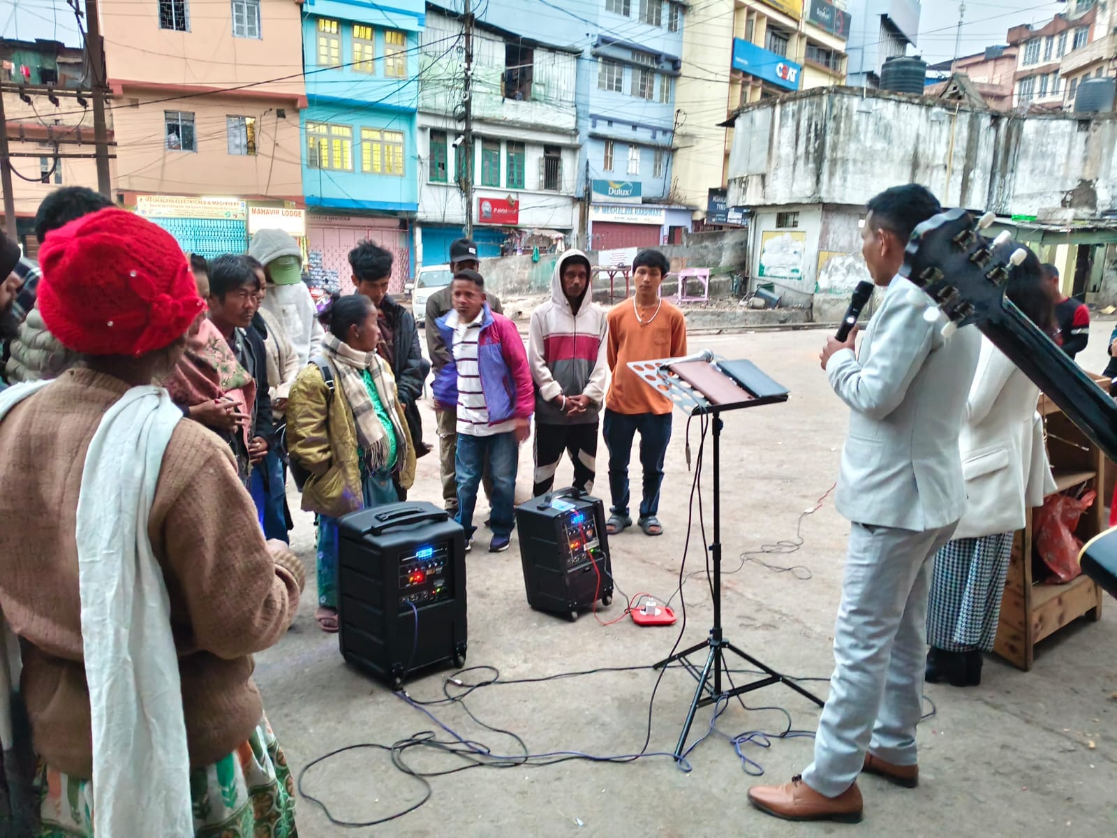 Street ministry with a sound system.